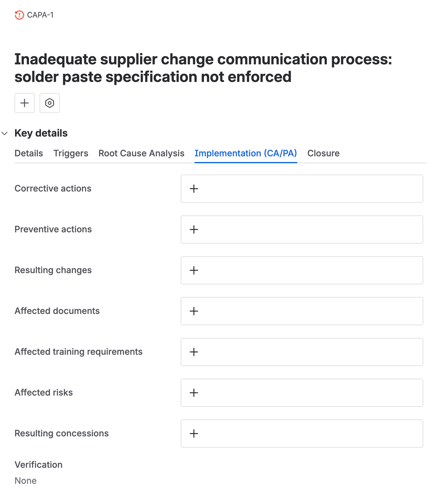 The implementation tab’s link fields for resulting changes, affected documents, affected training requirements, affected risks, and resulting concessions, each still empty.